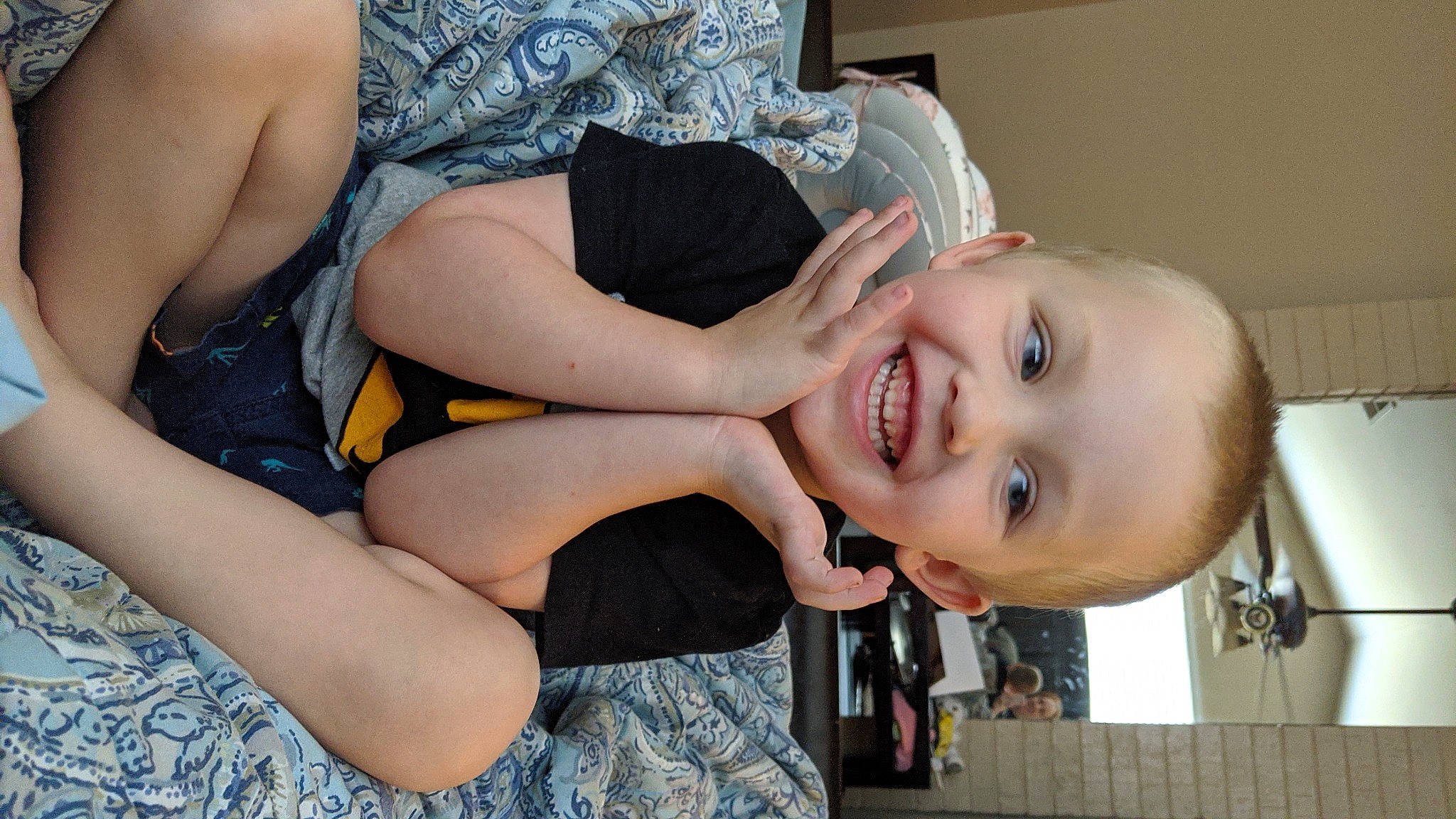 Liam is registered to the contest to win money with this photo: arm, black_hair, child, finger, joy, leg, mouth, person, thigh