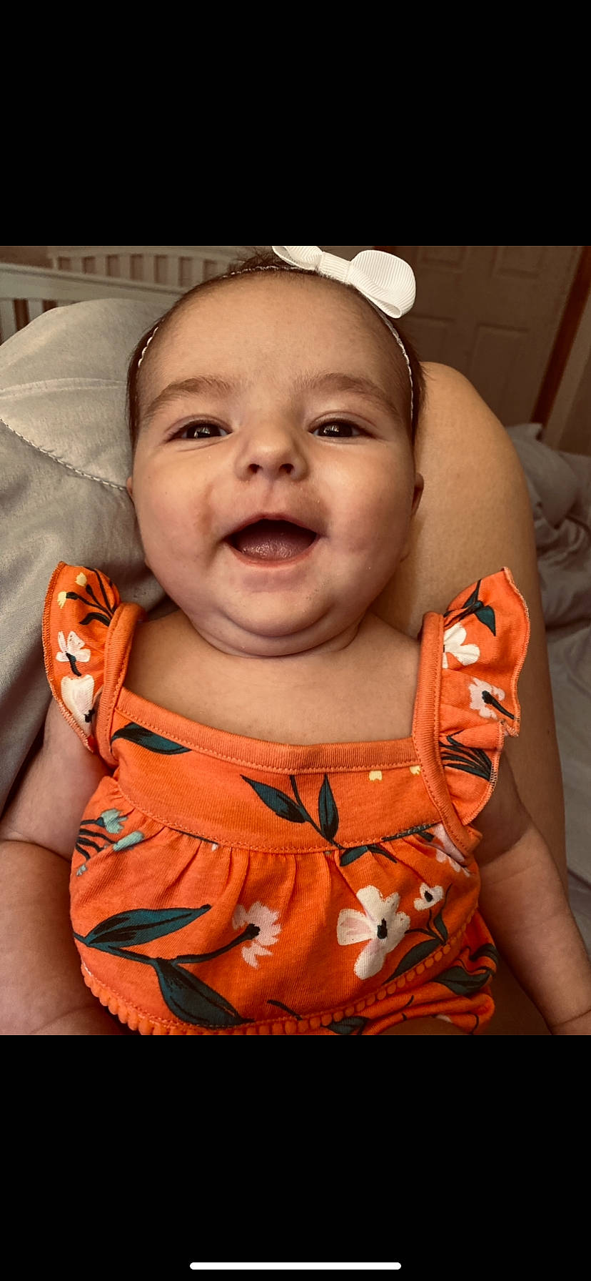 Remington is registered to the contest to win money with this photo: baby, baby_laughing, baby_toddler_clothing, cheek, child, eyebrow, eyelash, finger, flash_photography, fun, gesture, happy, mouth, nose, orange, person, pink, skin, sleeve, smile