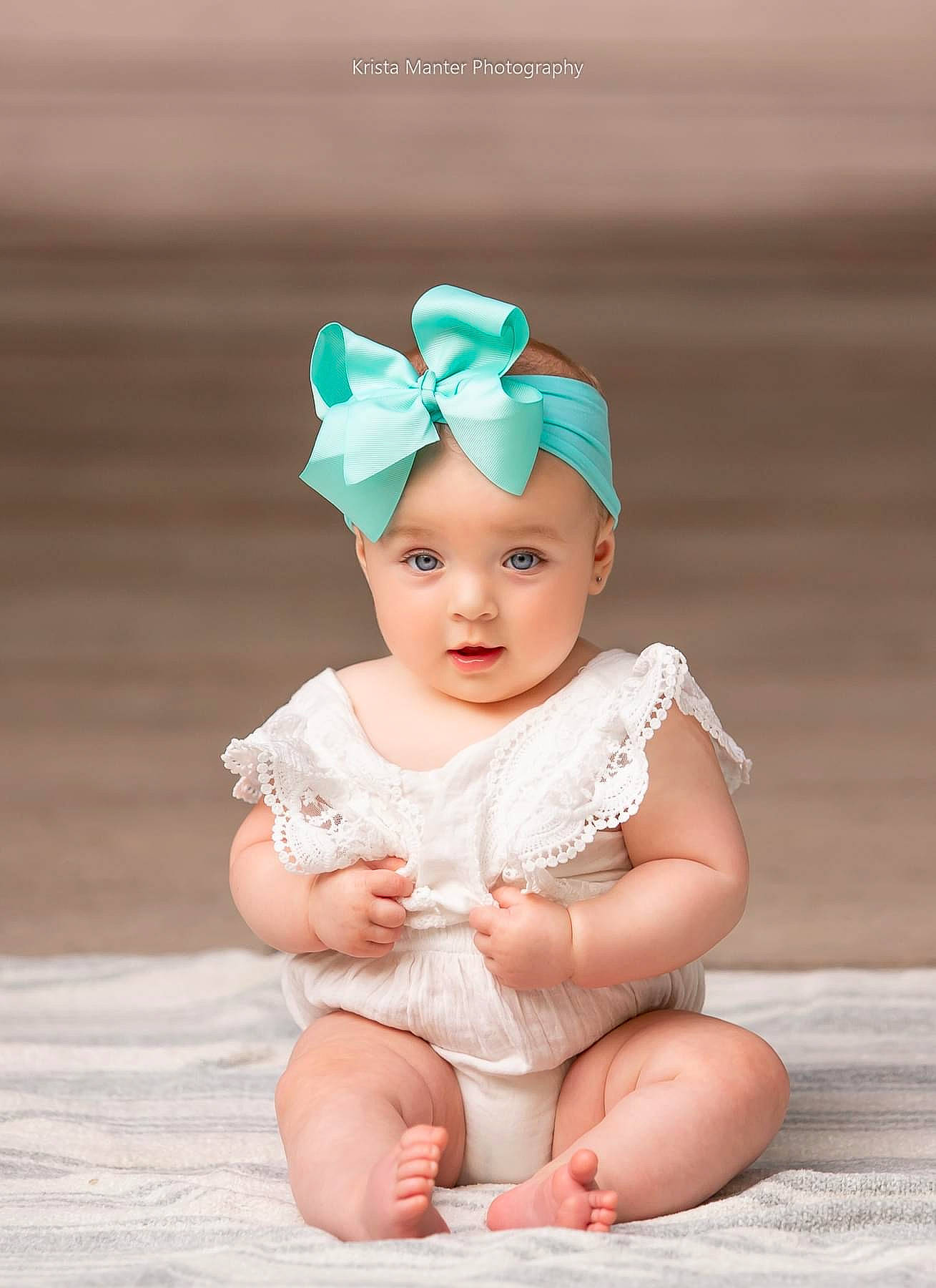 Charli is registered to the contest to win money with this photo: baby, baby_toddler_clothing, cheek, embellishment, eye, face, fashion_accessory, flash_photography, foot, fun, grass, hair_accessory, happy, headband, headgear, headpiece, headwear, human_body, peach, person