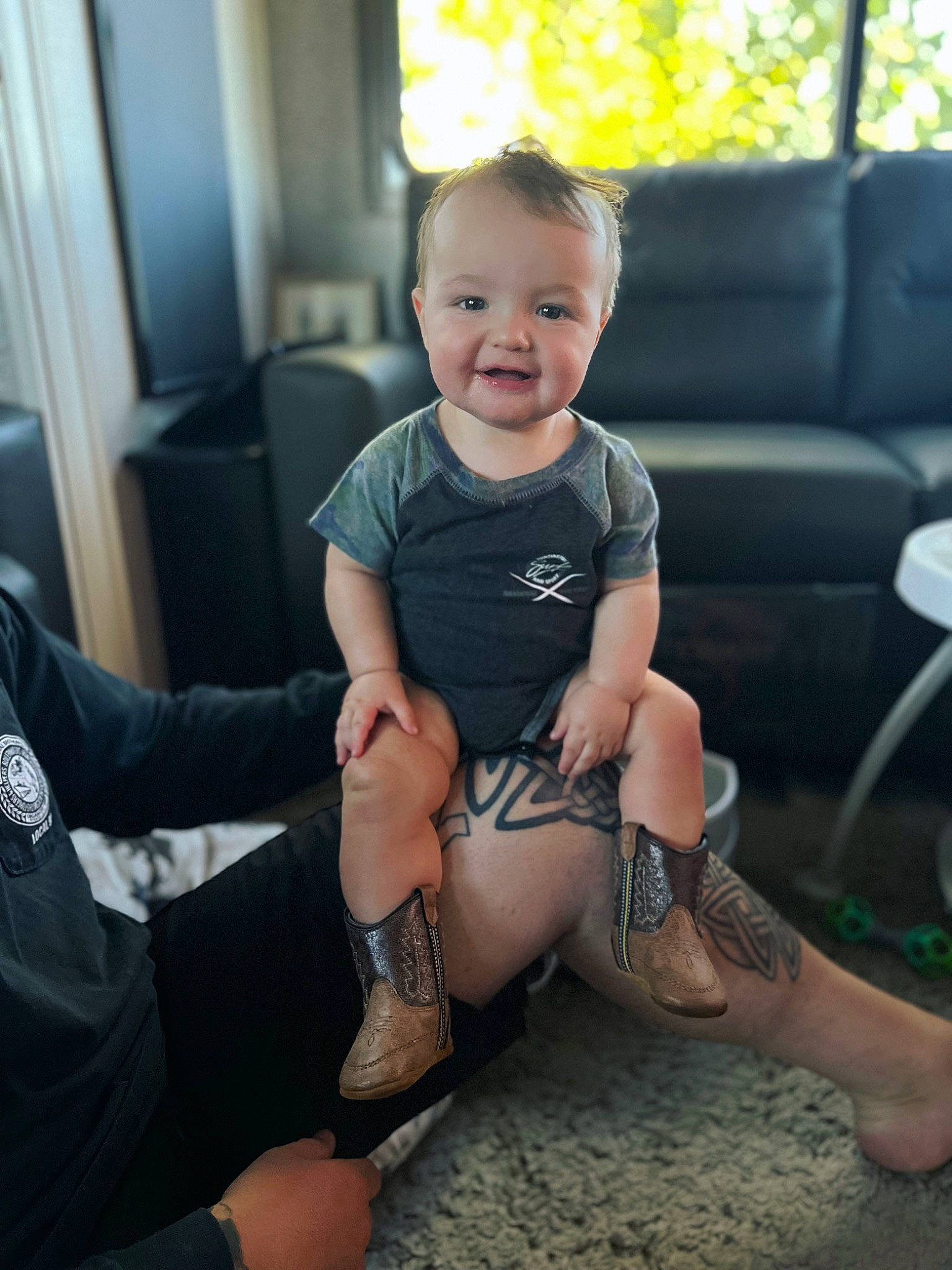 Gunner is registered to the contest to win money with this photo: comfort, cool, elbow, finger, foot, happy, human_leg, joint, joy, knee, lap, leg, muscle, person, shoulder, skin, sleeve, smile, sock, thigh