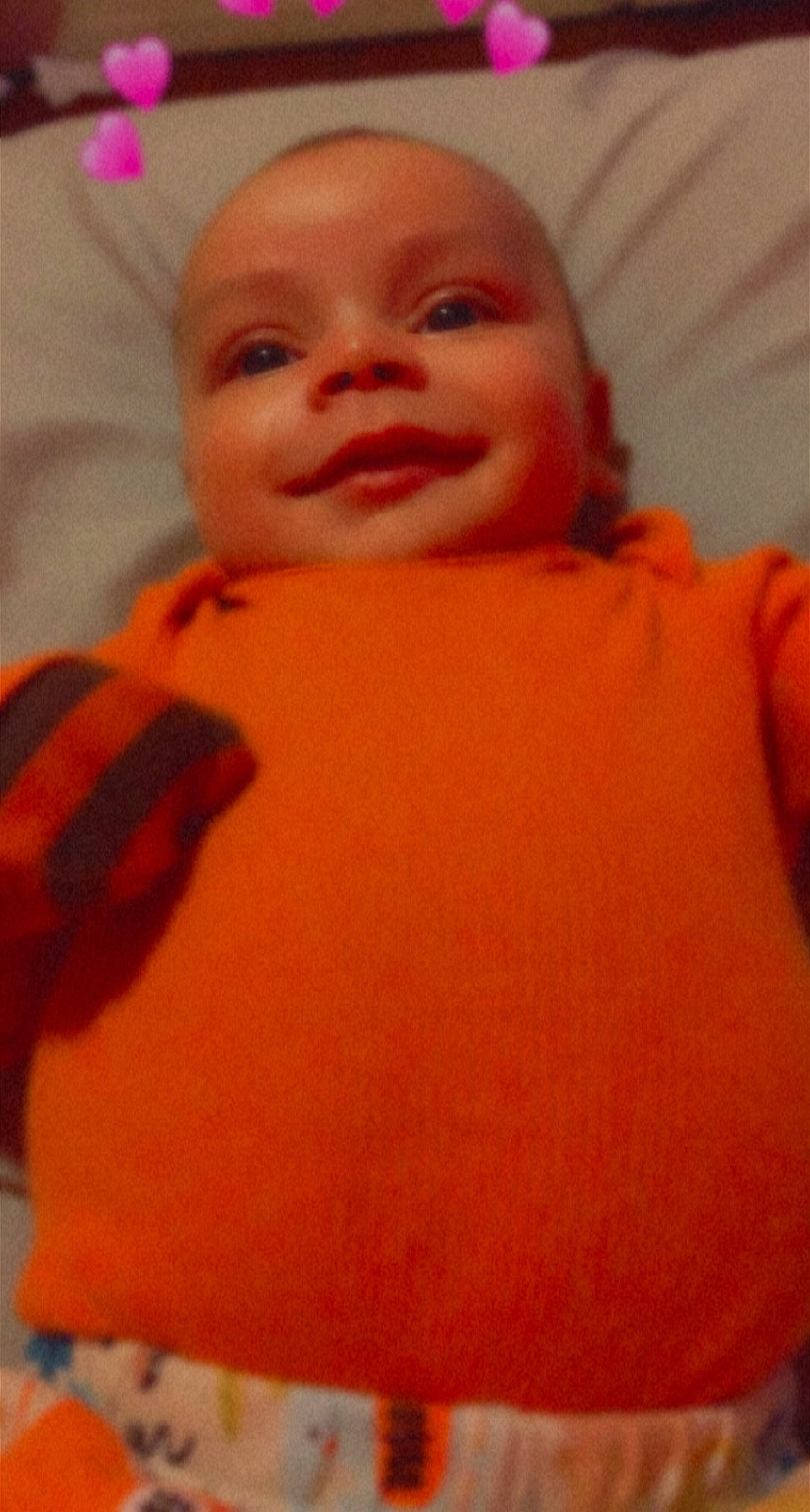 Dakai joined the competition — help win amazing prizes! baby, cheek, chin, comfort, eye, eyebrow, face, forehead, happy, head, iris, lip, mouth, nose, orange, person, pink, skin, sleeve, smile