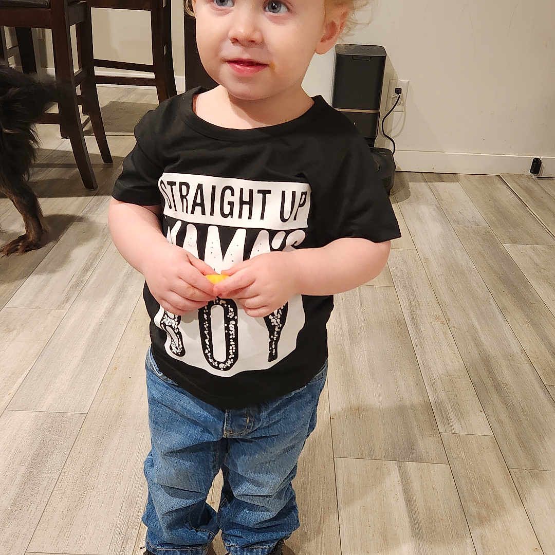 Maxton is registered to the contest to win money with this photo: animal, boy, canine, child, clothing, dog, face, footwear, hardwood, head, jeans, male, pants, person, photography, plywood, portrait, shoe, t_shirt, wood