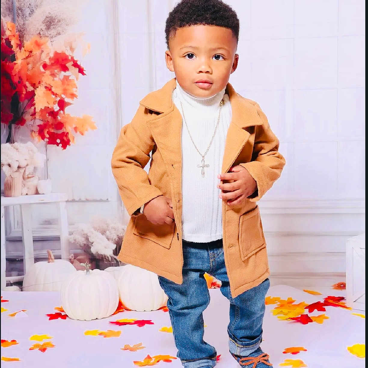 Chase is registered to the contest to win money with this photo: blazer, boy, child, clothing, coat, face, hair, happy, head, jacket, jeans, male, overcoat, pants, person, photography, portrait, sitting, sleeve, standing