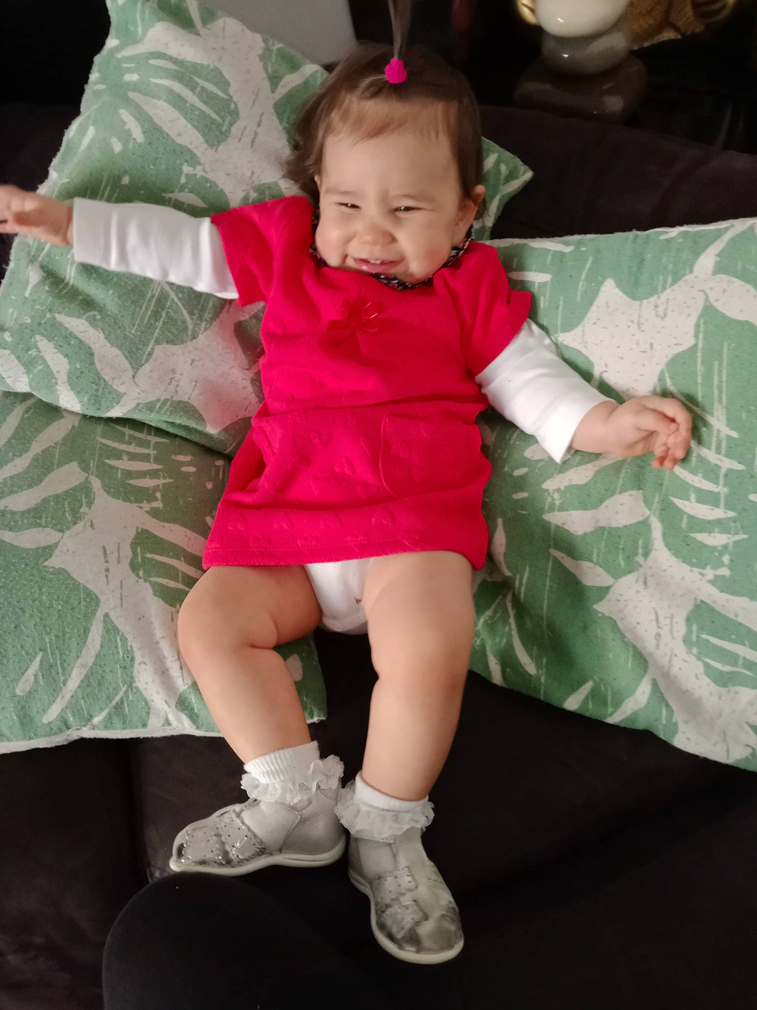 Nurya participe au concours pour gagner de l'argent avec cette photo : arm, baby, baby_toddler_clothing, child, dress, event, eye, green, hand, happy, human_leg, leg, person, pink, shorts, sleeve, smile, sock, t_shirt, thigh