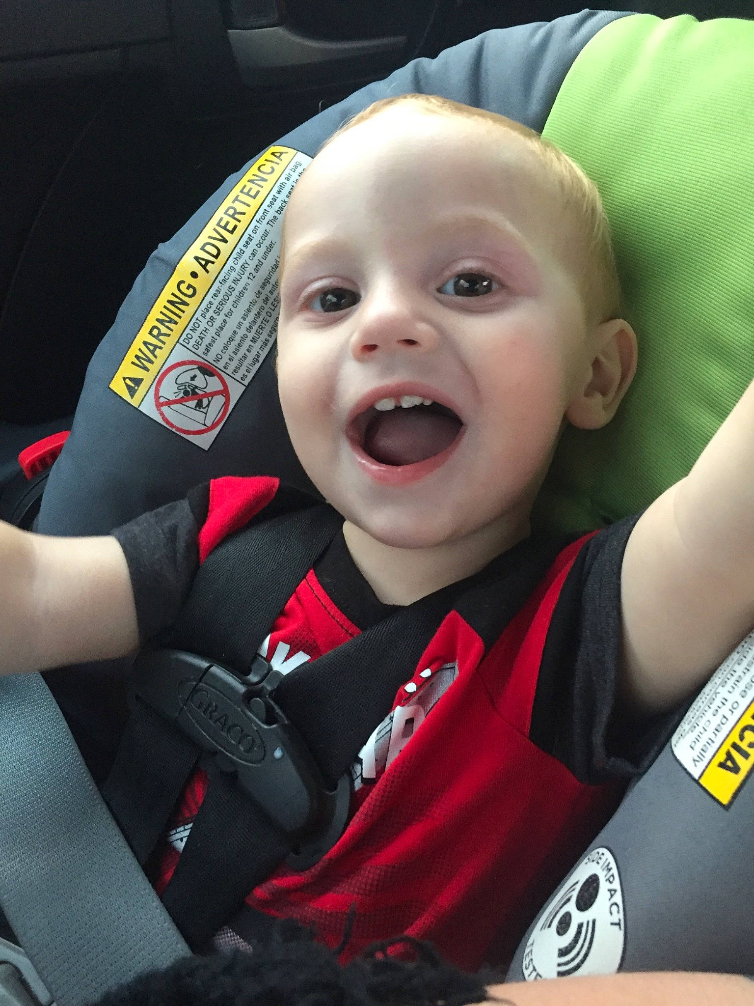 Jasper is registered to the contest to win money with this photo: auto_part, automotive_design, baby, baby_products, car_seat, car_seat_cover, carmine, child, chin, comfort, fun, gesture, happy, motor_vehicle, mouth, person, seat_belt, smile, steering_wheel, toddler