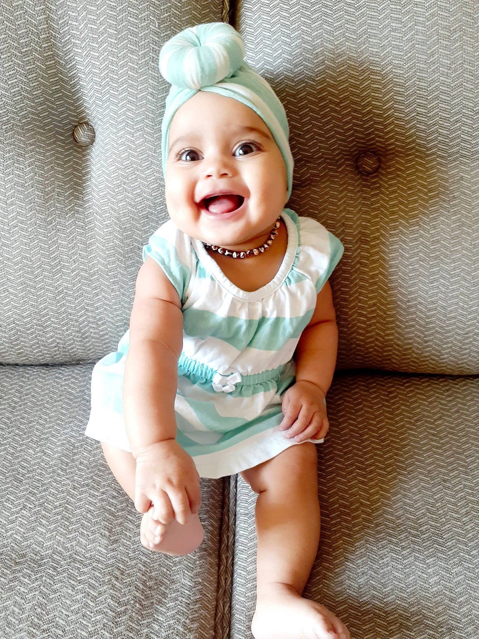 Lilianna is registered to the contest to win money with this photo: baby, baby_laughing, baby_products, baby_toddler_clothing, child, ear, facial_expression, happy, head, headgear, headwear, laugh, person, photography, product, sitting, skin, smile, toddler