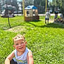 Ezra joined the competition — help win amazing prizes! child, toddler, smiling, grass, outdoor, sunlight, playground, blurred_background, sleeveless_shirt, happy, boy, nature, daylight, casual_clothing, greenery, park, people, background, summer, fun