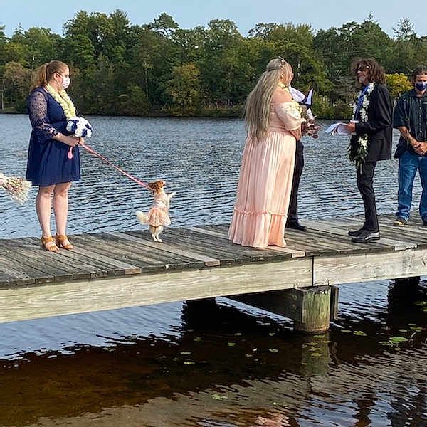Lily joined the competition — help win amazing prizes! bank, body_of_water, carnivore, dog, dog_walking, dress, footwear, human, lake, leash, leisure, reflection, tourism, vacation, water