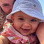 baby, blue_sky, child, closeup, clothing, cute, daylight, face, family, happy, hat, infant, joy, outdoor, person, portrait, skin, smile, sunhat, woman