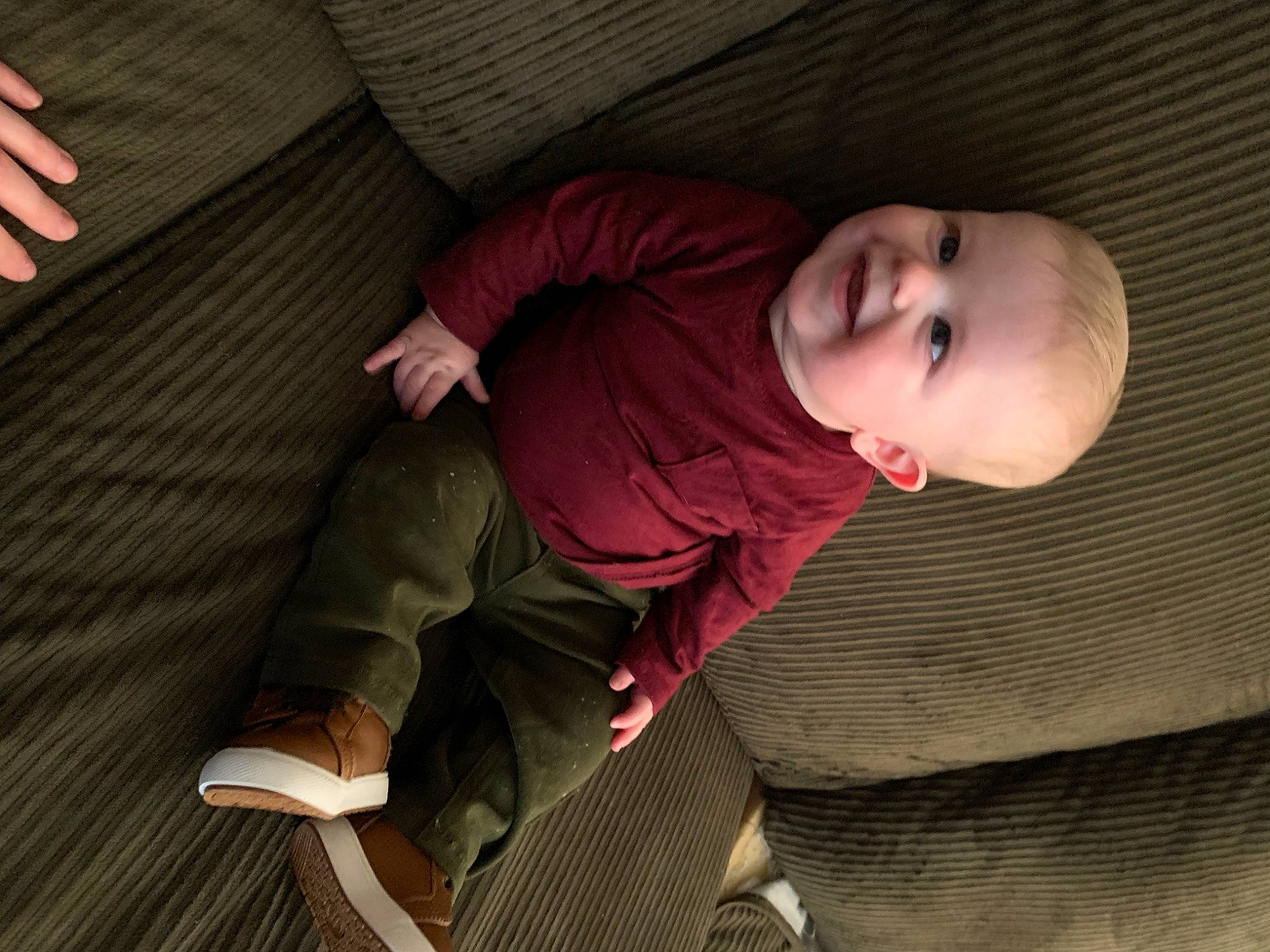 Koah is registered to the contest to win money with this photo: baby, baby_toddler_clothing, cheek, comfort, finger, floor, flooring, hairstyle, hand, human, joint, joy, mammal, mouth, nose, outerwear, person, skin, sleeve, textile