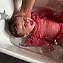 baby, infant, bath, bathtub, water, pink_clothing, happy, smiling, hand, support, wet_hair, splashing, white_tub, little_star, indoor, child, person, care, parent, foot