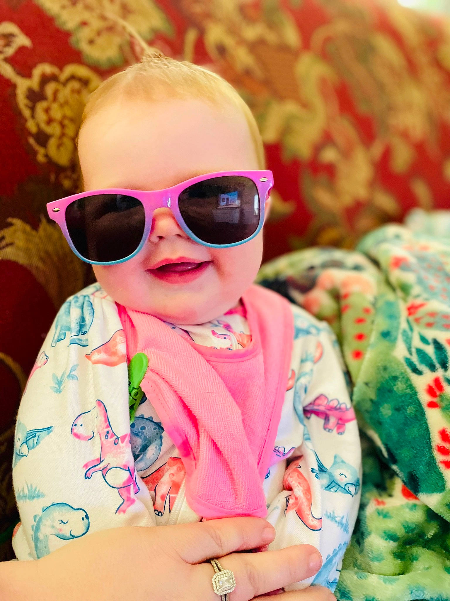 Adalynn is registered to the contest to win money with this photo: baby, baby_toddler_clothing, cheek, dress, eyewear, glasses, goggles, happy, lip, magenta, pattern, person, pink, plant, skin, sleeve, smile, sunglasses, textile, toddler