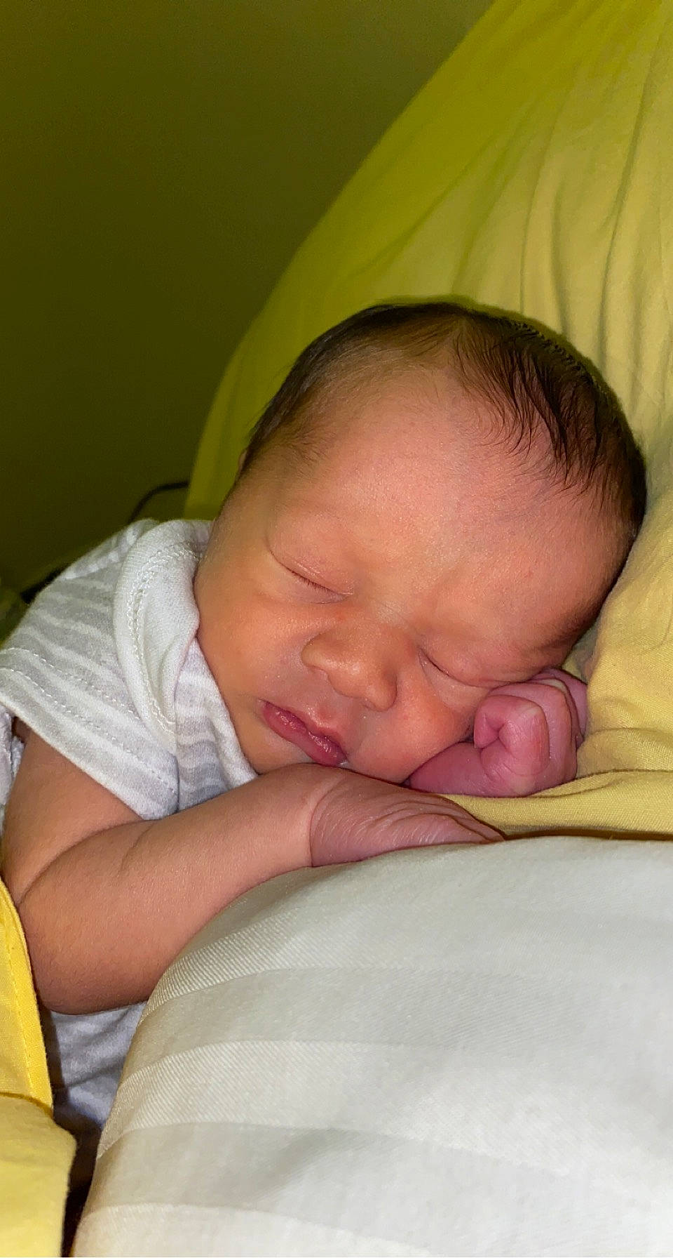 Bryston is registered to the contest to win money with this photo: baby, baby_toddler_clothing, bedtime, cheek, child, chin, comfort, eyebrow, finger, flesh, head, linens, mouth, nap, nose, person, portrait_photography, skin, sleep, thumb