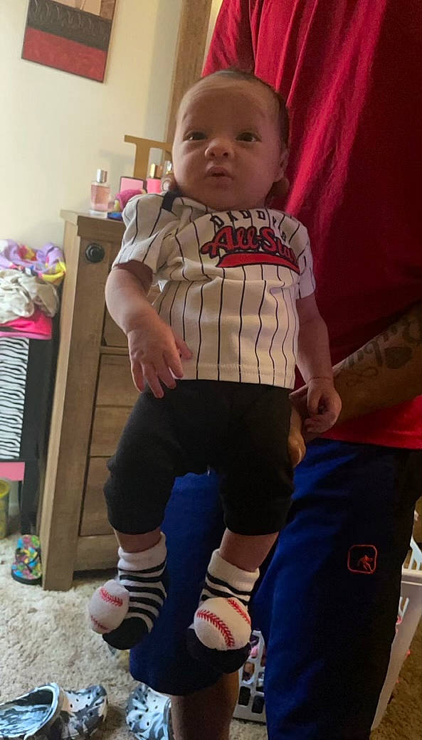 Bryston joined the competition — help win amazing prizes! baby, baby_toddler_clothing, chest, child, face, finger, human_leg, joint, knee, person, pink, skin, sleeve, sock, sportswear, t_shirt, textile, thigh, toddler, trunk