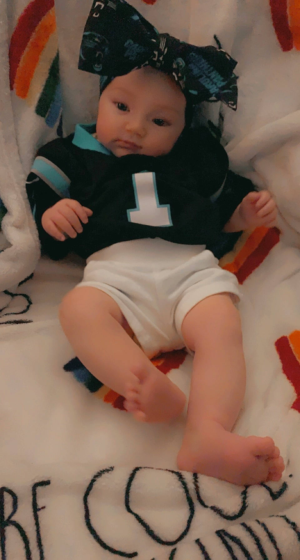 Gracelyn is registered to the contest to win money with this photo: baby_toddler_clothing, cheek, comfort, doll, eye, finger, hairstyle, head, headwear, joint, knee, mouth, person, pink, shorts, skin, sleeve, textile, thigh, toy