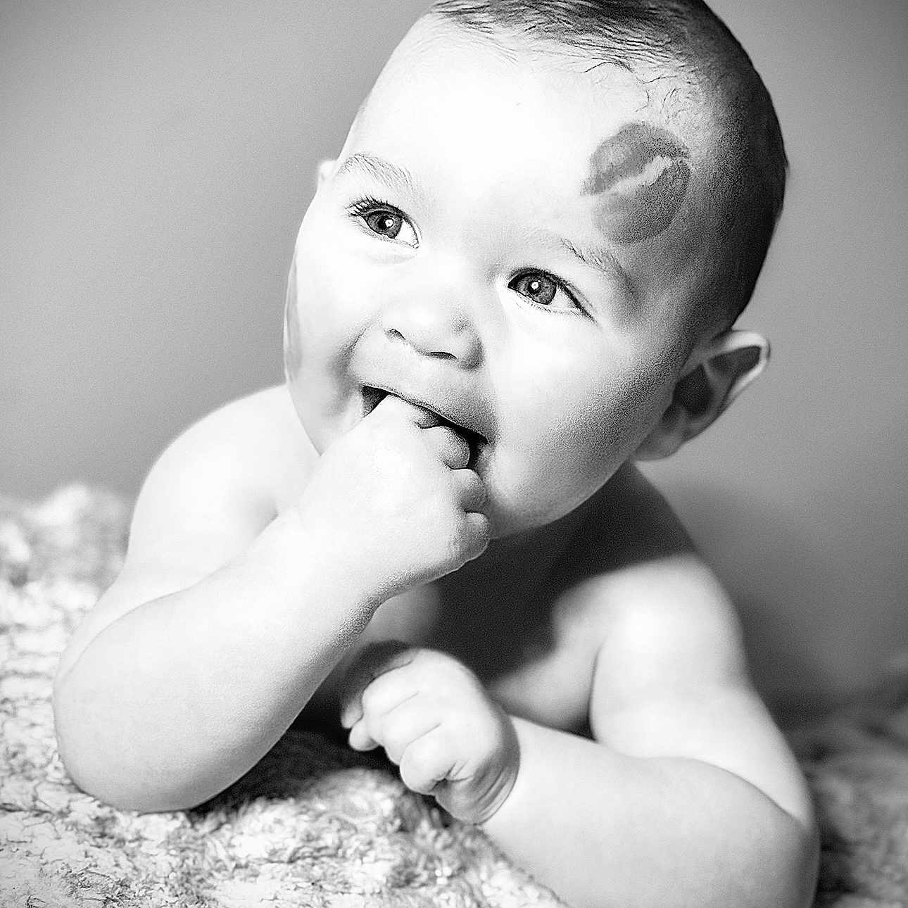 Jaxon is registered to the contest to win money with this photo: arm, baby, babylaughing, back, biting, bodypart, face, finger, hand, happy, head, indoors, laughing, mouth, newborn, person, photography, portrait, smile, teeth