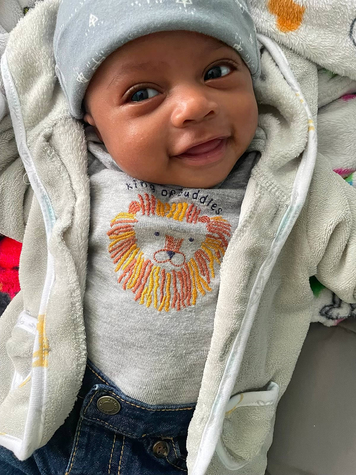 Hezekiah joined the competition — help win amazing prizes! baby_toddler_clothing, cheek, chin, clothing, eye, face, happy, headwear, human_body, iris, jacket, lip, nose, organ, outerwear, person, skin, sleeve, smile, textile
