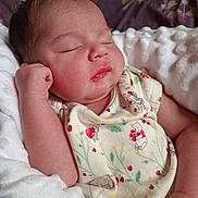 Freya joined the competition — help win amazing prizes! baby, newborn, sleeping, blanket, onesie, cute, infant, peaceful, child, soft, resting, closed_eyes, fist, skin, portrait, indoors, comfort, clothing, young_child, cozy