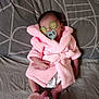 baby, infant, pacifier, pink_robe, slippers, bed, blanket, sleeping, indoor, person, cute, soft, small, child, rest, cozy, clothing, head, hand, footwear