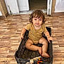 Yacine participe au concours pour gagner de l'argent avec cette photo : baby, barefoot, child, curious, curly_hair, cute, door, floor, home, indoors, person, plastic_crate, playful, room, sitting, smile, toddler, wooden_floor, yellow_onesie, young_child