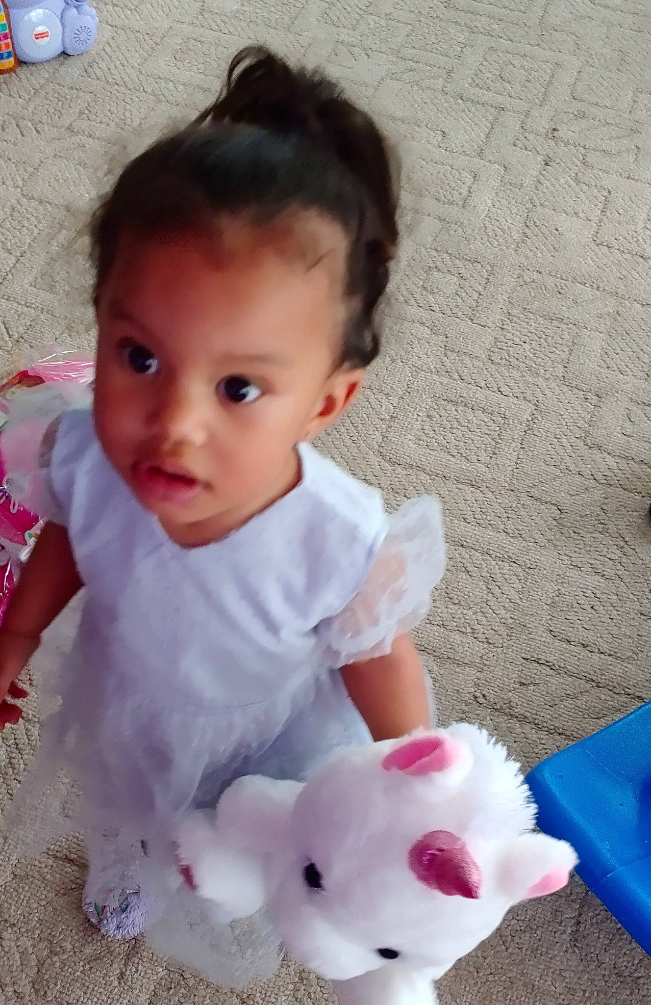 Miraya joined the competition — help win amazing prizes! baby, baby_products, baby_toddler_clothing, blue, cheek, child, dress, flooring, fun, happy, iris, mammal, nose, person, pink, sitting, skin, sleeve, toddler, toy