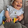 Alanna is registered to the contest to win money with this photo: baby, infant, child, smiling, happy, portrait, sitting, bouncer, baby_chair, headband, bow, blue_clothing, dress, toy, elephant_toy, blanket, indoor, nursery, closeup, face