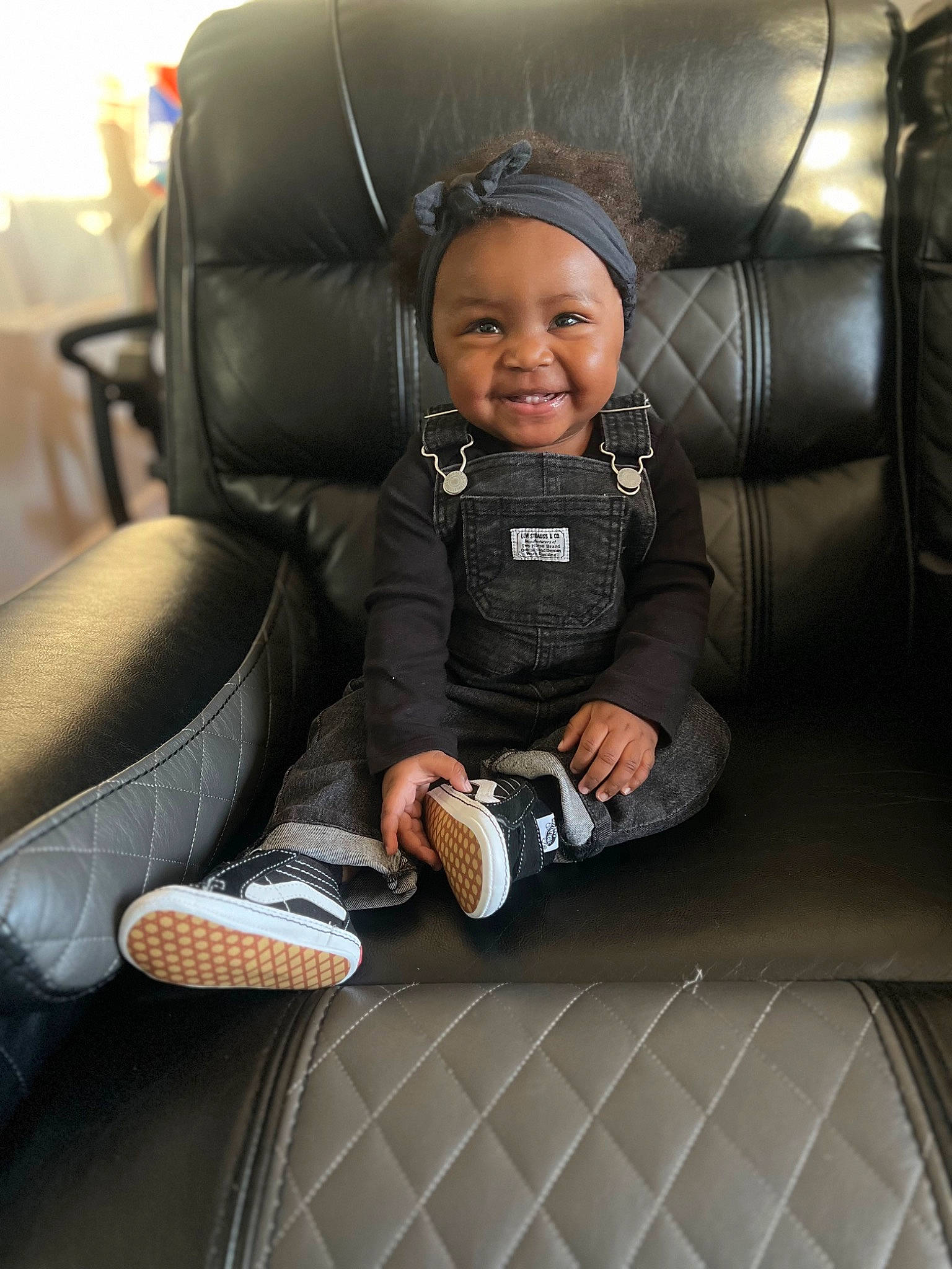 Brooke is registered to the contest to win money with this photo: air_travel, auto_part, automotive_design, baby, baby_products, car_seat, chair, child, comfort, family_car, head_restraint, joy, luxury_vehicle, motor_vehicle, person, personal_luxury_car, sitting, smile, thumb, toddler