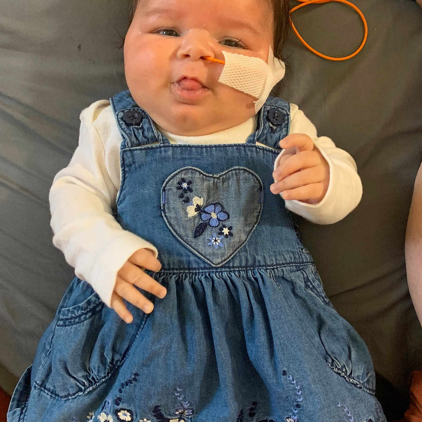 Emmarose joined the competition — help win amazing prizes! baby, clothing, coat, cream, dessert, dress, eating, face, food, head, icecream, jacket, jeans, pants, person, photography, portrait, sitting, sleeve, vest