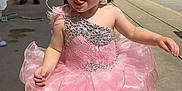 Brynleigh joined the competition — help win amazing prizes! toddler, child, pink_dress, headband, outdoor, sidewalk, sunlight, playful, tongue_out, curly_hair, people, car, concrete, dress, shoes, white_socks, sparkles, cute, portrait, daytime
