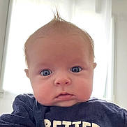 Raphaël a rejoint le concours — aidez-le/la à gagner de superbes lots ! baby, blue_eyes, child, closeup, clothing, curtains, cute, expression, face, hair, indoors, infant, mohawk, navy_blue, portrait, shirt, skin, soft_light, window, young