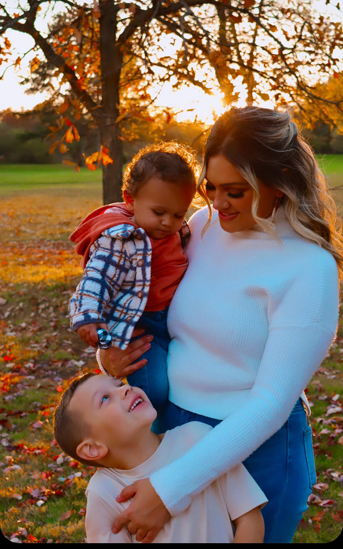 Corey joined the competition — help win amazing prizes! botany, clothing, face, facial_expression, gesture, grass, hairstyle, happy, head, joy, leaf, orange, people_in_nature, person, photograph, plant, sky, smile, standing, sunlight