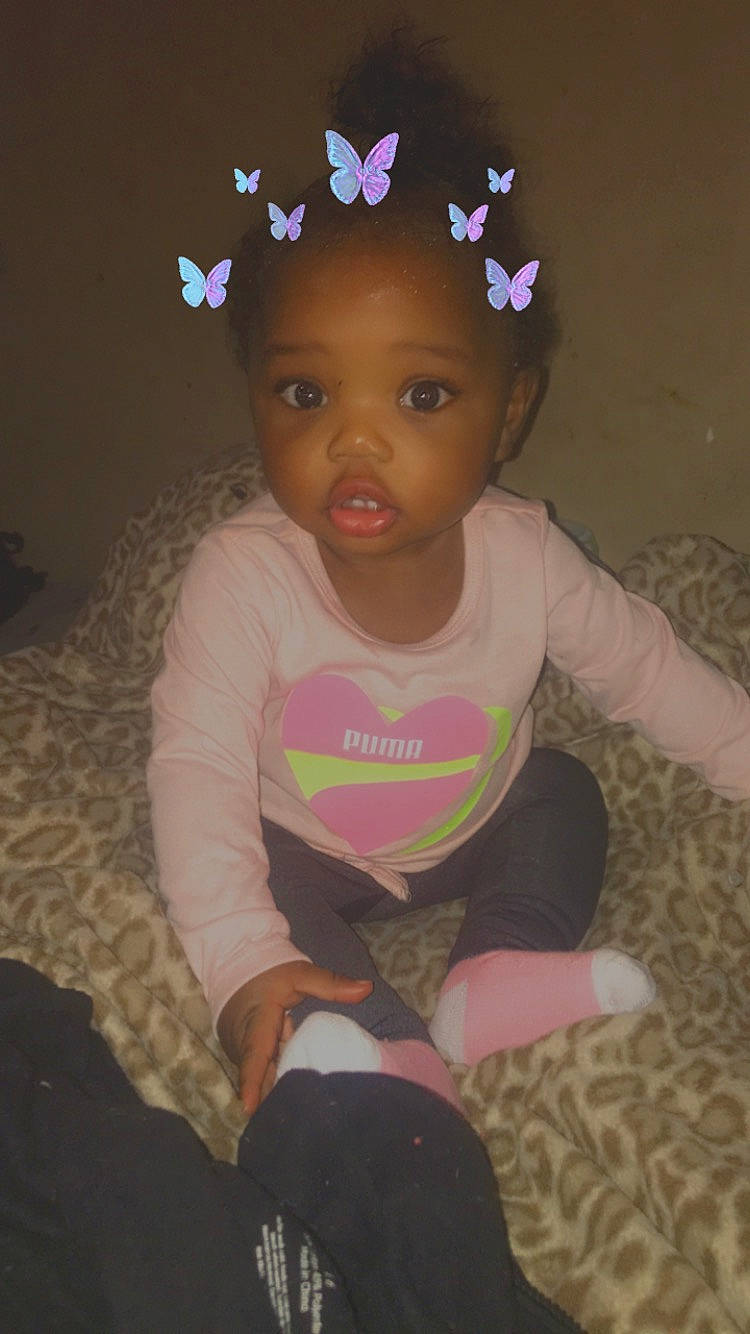 Chelsey is registered to the contest to win money with this photo: baby, baby_toddler_clothing, cheek, child, costume_accessory, embellishment, hair_accessory, headband, headgear, headpiece, lap, mouth, person, pink, skin, sock, toddler