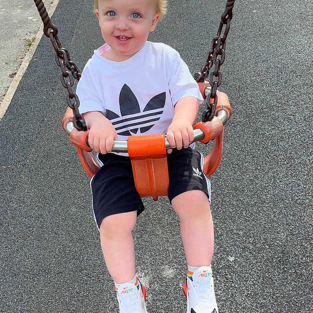 Jace is registered to the contest to win money with this photo: boy, child, clothing, face, footwear, grass, head, male, nature, outdoorplayarea, outdoors, park, person, photography, plant, playarea, portrait, shoe, shorts, sneaker