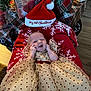 Scarlette joined the competition — help win amazing prizes! baby, infant, dress, sparkly, christmas, holiday, gift, present, tree, ornament, blanket, floor, wooden_floor, red, gold, white, snowflake, hat, festive, cute