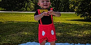 Knox joined the competition — help win amazing prizes! toddler, child, outdoor, grass, blanket, costume, mouse_ears, red_shorts, yellow_bow_tie, smiling, standing, sunlight, nature, greenery, happy, cute, person, summer, playful, portrait