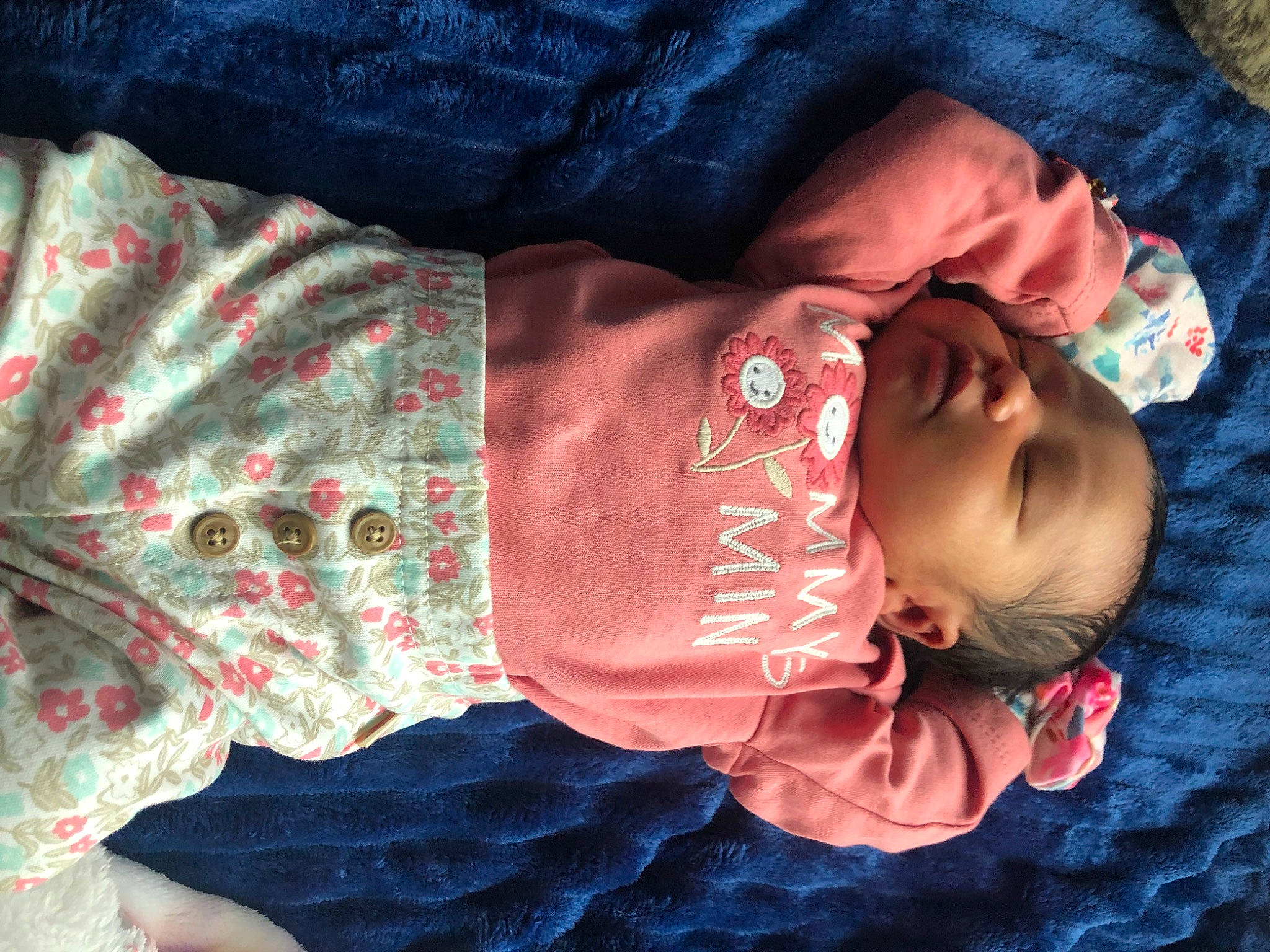 Aubree is registered to the contest to win money with this photo: arm, baby, baby_products, baby_toddler_clothing, child, comfort, hand, head, human_body, pattern, person, sitting, skin, sleeve, textile, toddler, tree