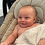Bode joined the competition — help win amazing prizes! baby, infant, smile, blanket, cushion, baby_seat, skin, happy, indoors, child, cute, face, young, plush, comfort, cozy, person, head, expression, relaxation