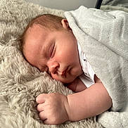 Bode joined the competition — help win amazing prizes! baby, sleeping, blanket, soft, cozy, infant, peaceful, skin, hand, face, closeup, rest, comfort, nap, child, bed, furry, warm, cuddle, relax