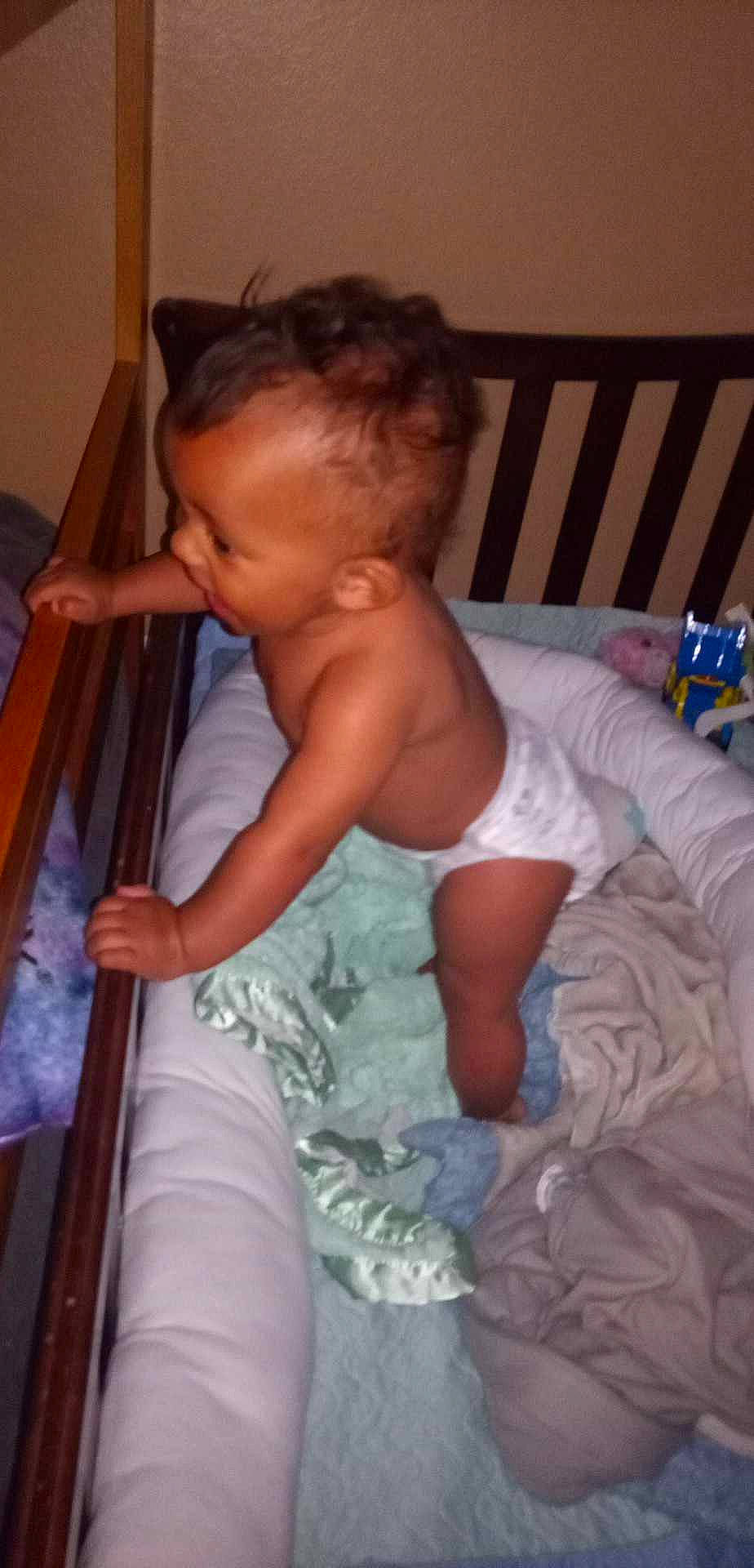 Jaxon is registered to the contest to win money with this photo: arm, baby, baby_safety, baby_toddler_clothing, cheek, chest, child, comfort, cradle, finger, flooring, fun, hand, human_body, infant_bed, mouth, muscle, person, skin, thumb