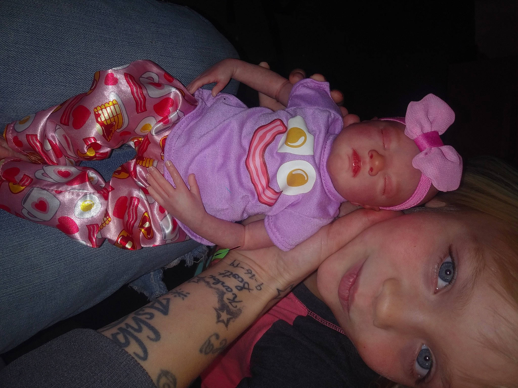 Ashby is registered to the contest to win money with this photo: arm, baby_toddler_clothing, cheek, child, ear, eye, eyebrow, eyelash, forehead, head, human, iris, lip, mammal, mouth, nose, organ, person, pink, skin