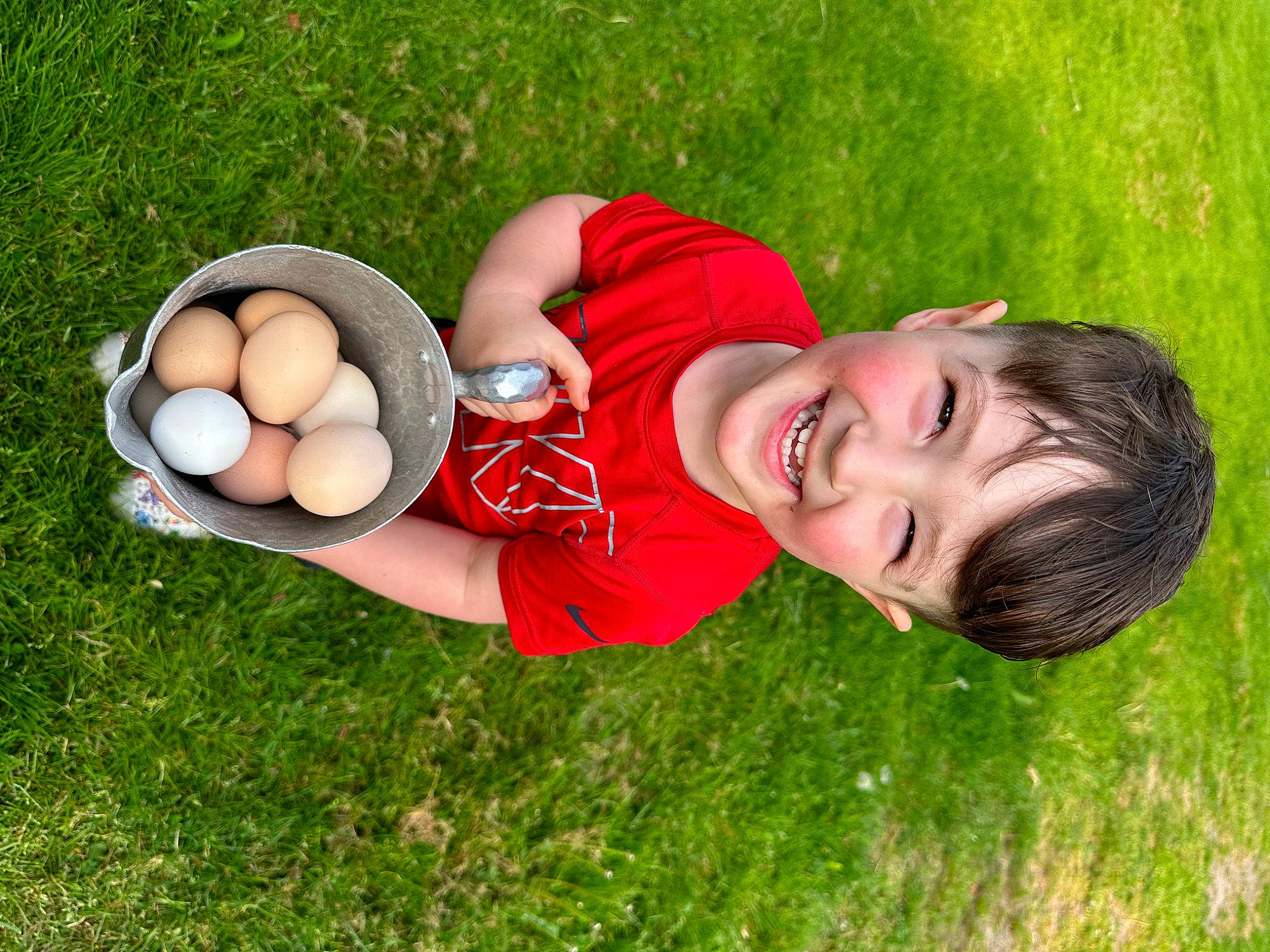 Kyson is registered to the contest to win money with this photo: baby, ball, child, competition_event, eye, fun, grass, grassland, happy, hat, joy, laugh, leisure, meadow, people_in_nature, person, play, recreation, smile, soccer_ball