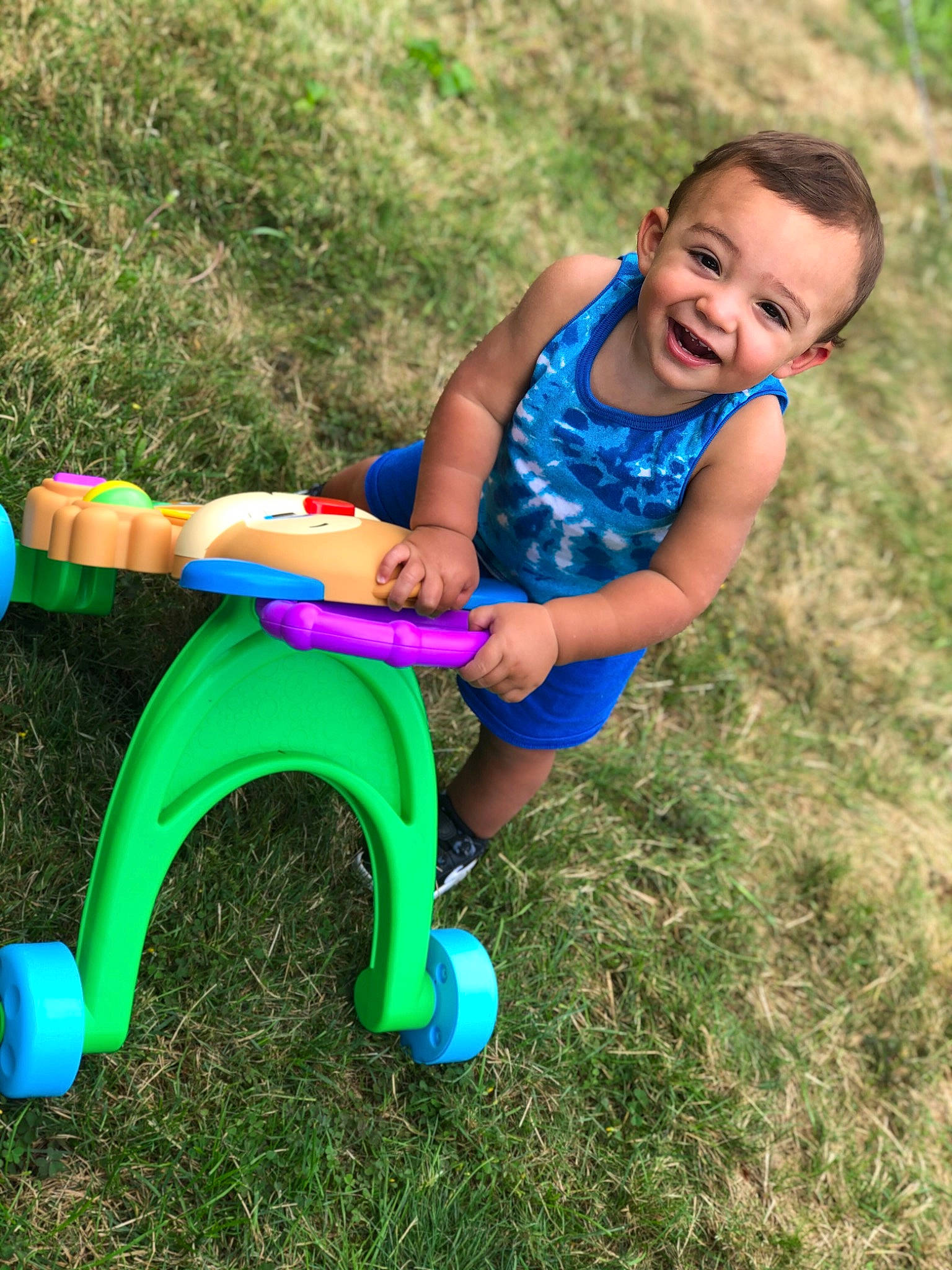 Noah joined the competition — help win amazing prizes! child, fun, grass, green, happy, joy, lawn, leisure, meadow, person, plant, play, sitting, smile, summer, toddler, vacation, vehicle