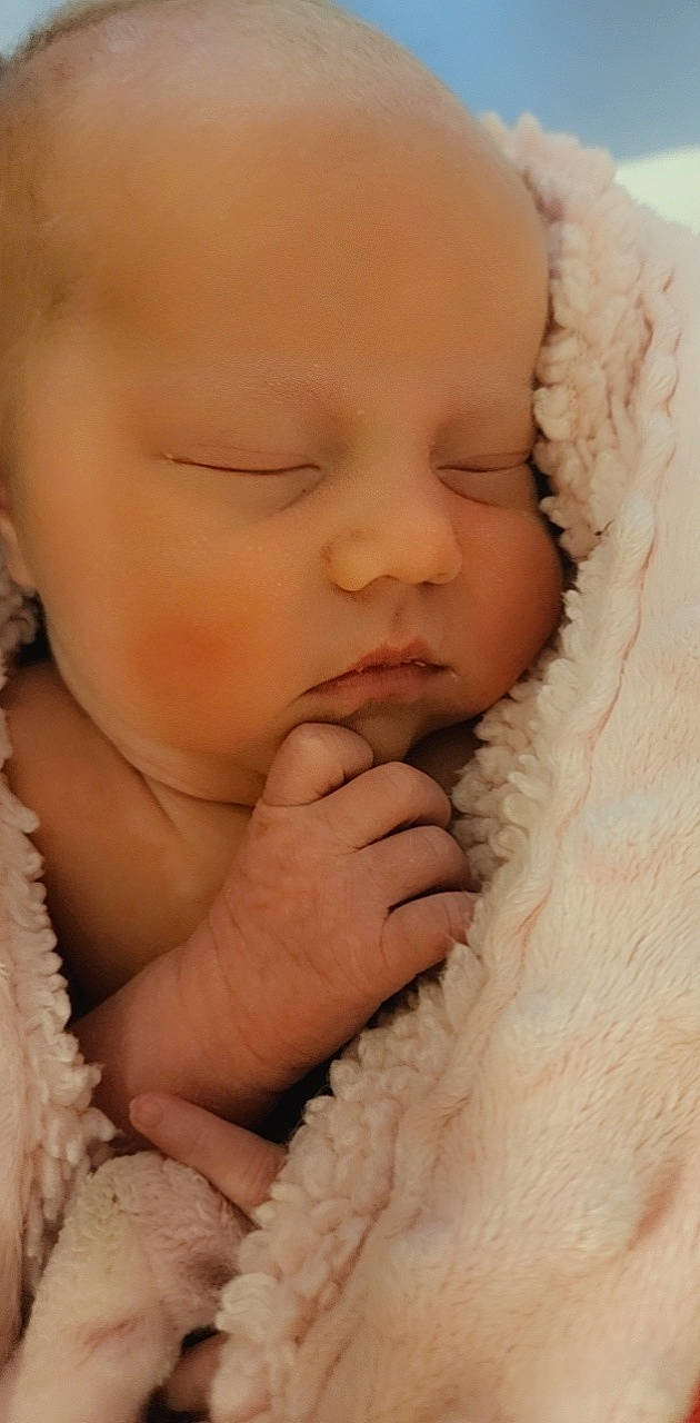 Stormy is registered to the contest to win money with this photo: arm, baby, baby_sleeping, baby_toddler_clothing, cheek, comfort, eyelash, finger, gesture, hand, happy, human_body, iris, lip, mammal, mouth, nose, person, skin, sleeve