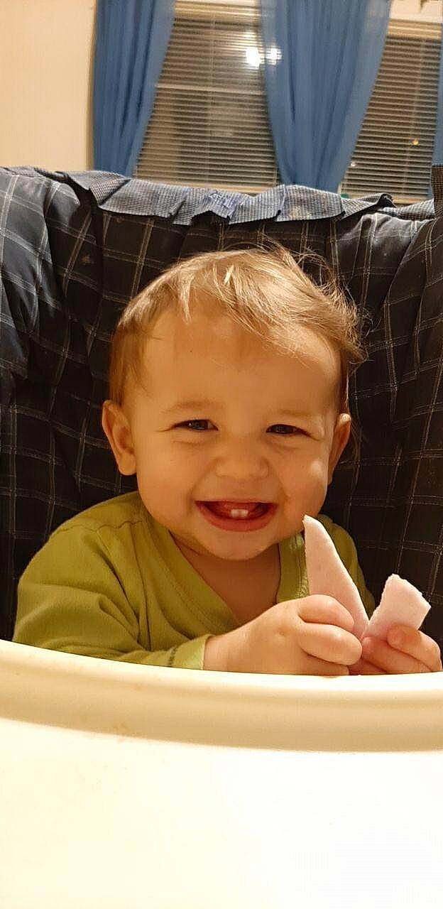 Preston is registered to the contest to win money with this photo: baby, cheek, child, comfort, face, facial_expression, finger, fun, gesture, hair, happy, head, human_body, joy, nose, organ, person, product, skin, smile