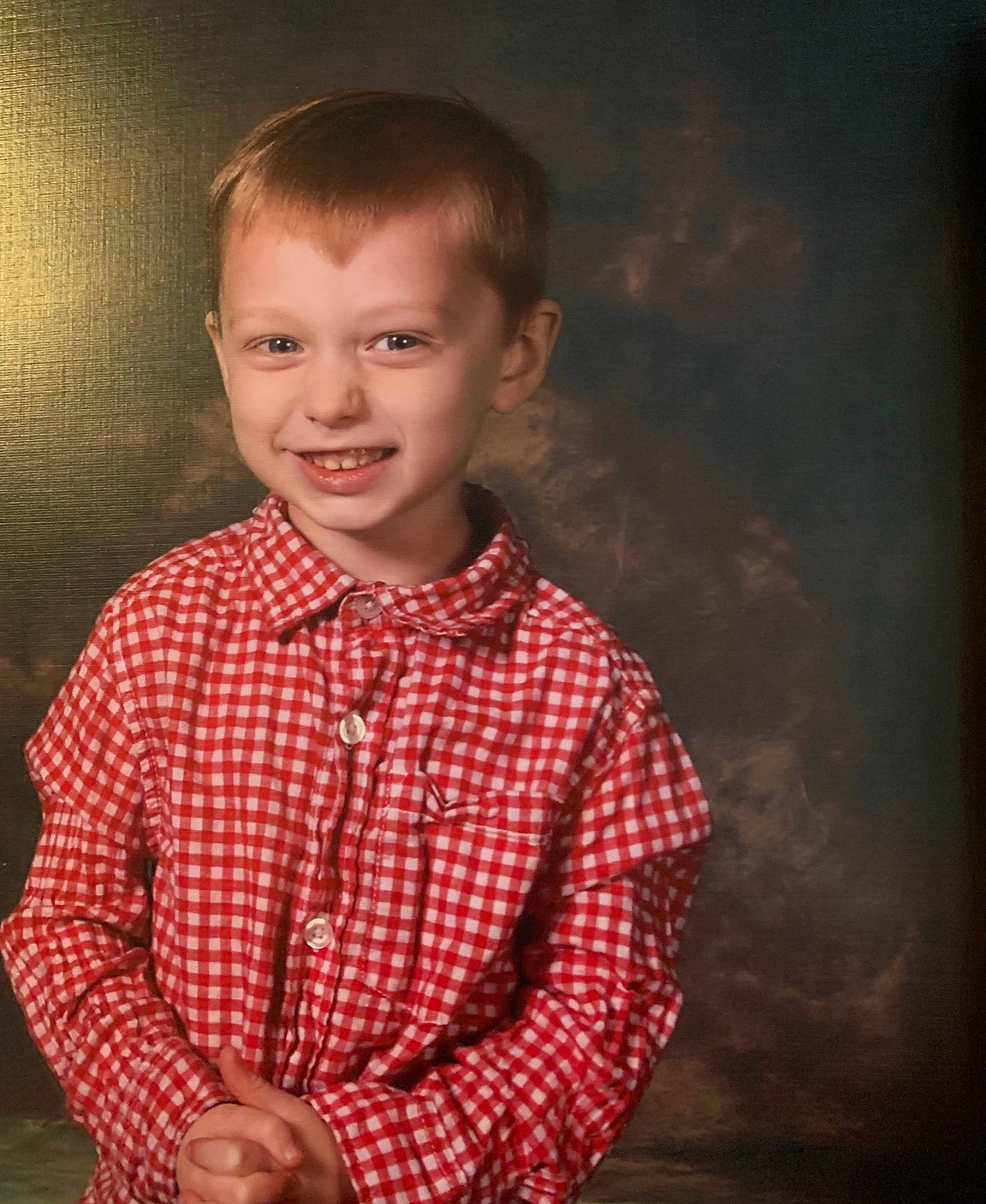 Jonathan is registered to the contest to win money with this photo: baby_toddler_clothing, cheek, child, collar, dress_shirt, facial_expression, flash_photography, fun, gesture, happy, joy, lip, outerwear, pattern, person, plaid, sleeve, smile, standing, t_shirt