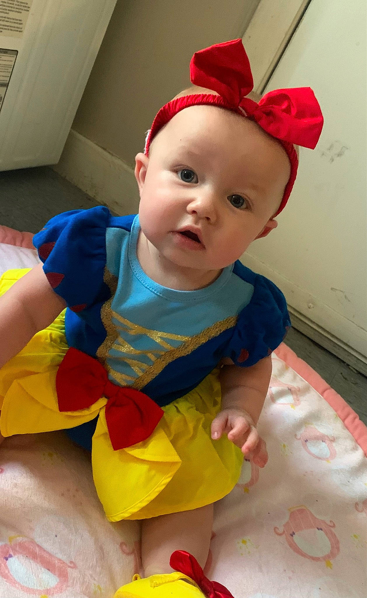Adalynn joined the competition — help win amazing prizes! baby, baby_products, baby_toddler_clothing, cap, cheek, child, costume_hat, dress, eye, fun, happy, head, human_body, pattern, person, pink, red, room, skin, sleeve