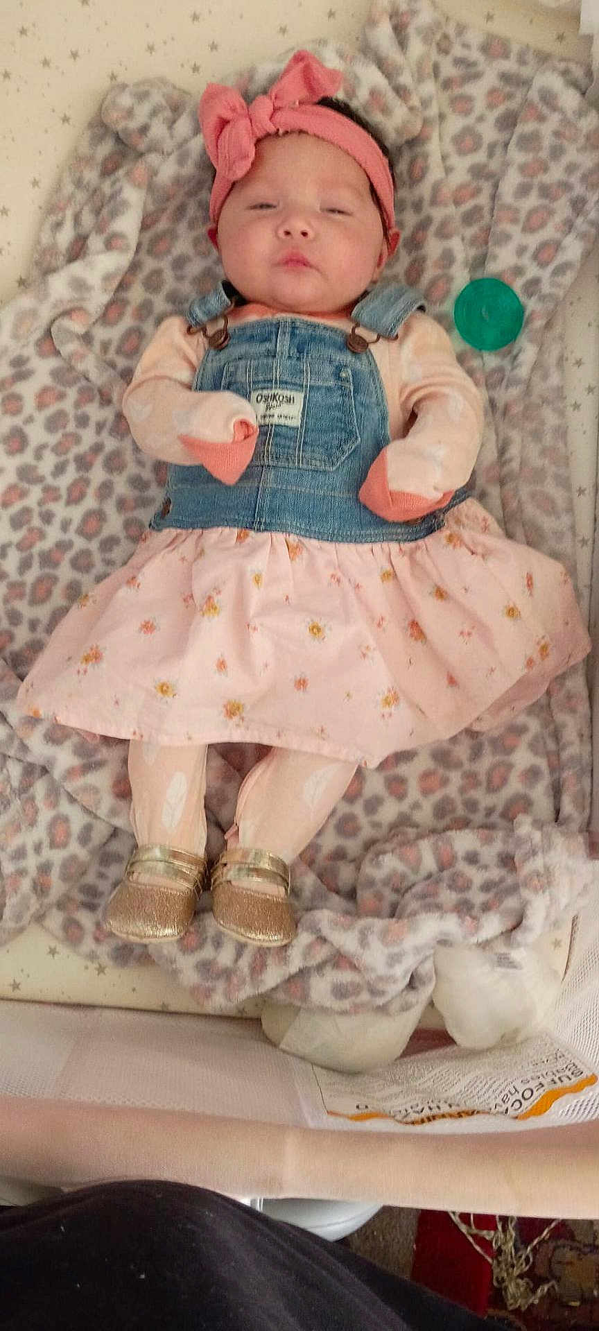 Estrella Luna is registered to the contest to win money with this photo: baby, blanket, child, cute, denim, dress, fabric, footwear, gold_shoes, headband, indoor, infant, laying_down, leopard_print, pacifier, pattern, person, pink, sleepy, soft_toys