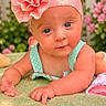 baby, infant, headband, flower, blanket, greenery, outdoor, garden, picket_fence, curious, child, cute, portrait, pink, blue_eyes, soft_texture, summer, toddler, smiling, natural_light