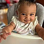 Haven joined the competition — help win amazing prizes! toddler, child, high_chair, smile, face, arm, curly_hair, indoor, baby, person, cute, happy, infant, clothing, bib, skin, expression, playful, young_child, portrait
