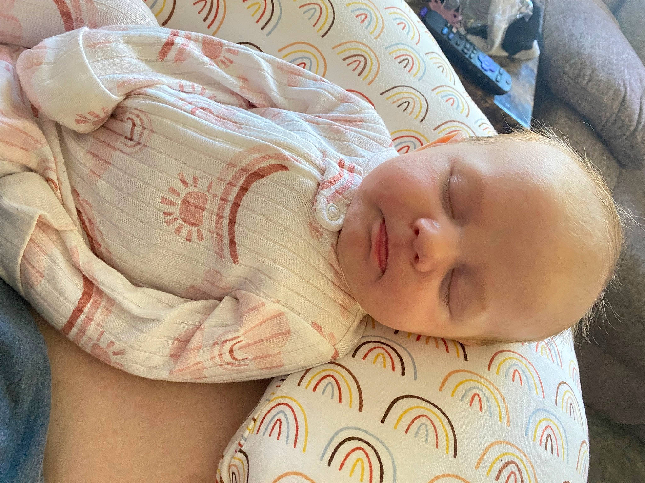 Mariya is registered to the contest to win money with this photo: abdomen, baby, baby_toddler_clothing, cheek, chest, child, comfort, eye, eyelash, facial_expression, head, human_leg, linens, mouth, nail, nose, pattern, person, skin, toddler